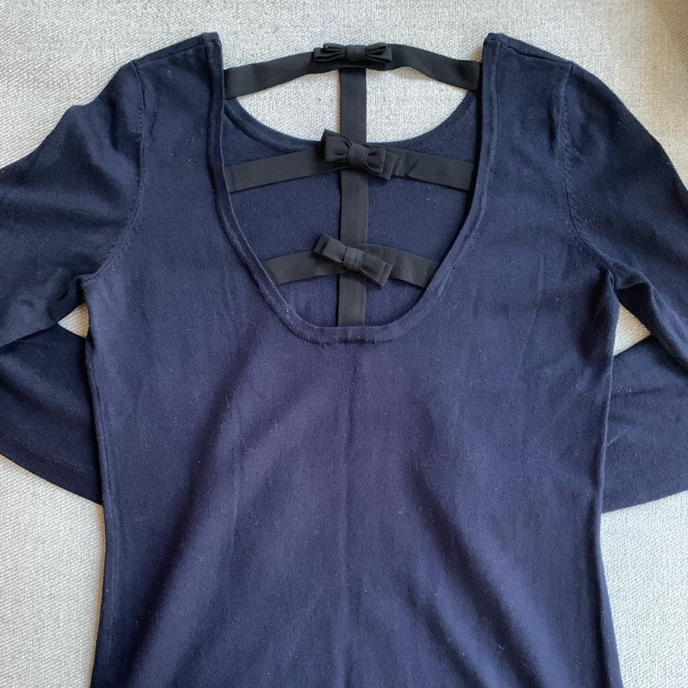 Navy sweater w bows down the back